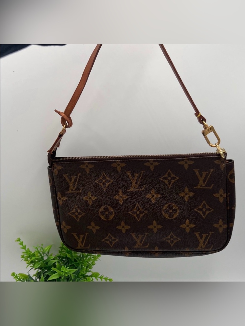Louis Vuitton Monogram shoulder bag pouch.